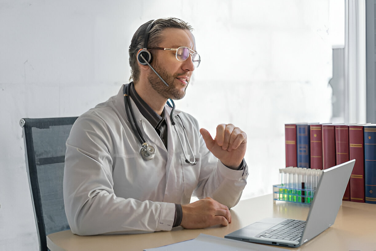 PY Healthcare provider with patient